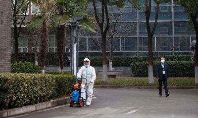 OMS: especialistas come�am a deixar a China sem resultados conclusivos