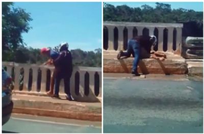 Motociclista impede rapaz de pular do Port�o do Inferno