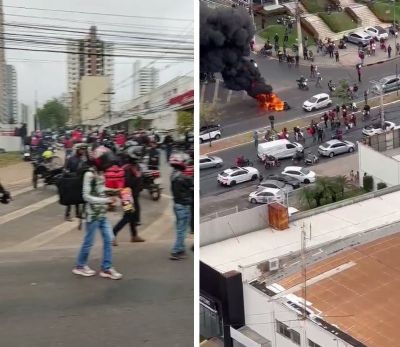 E​ntregadores fecham Av. Fernando Corr�a em protesto por morte de motoboy